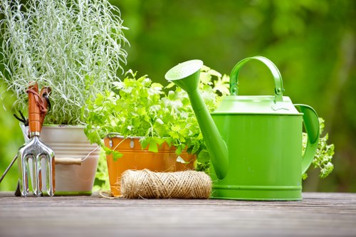 Gardening team setting up a safe work area in a residential garden